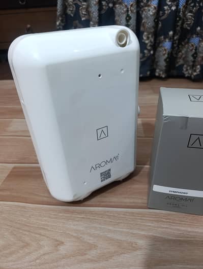 Aroma diffuser with essential oil