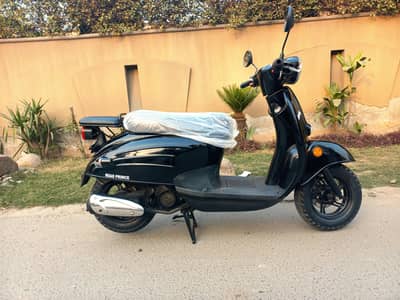 Road prince Bella  100 CC petrol totall new scooty 3500 km driven only