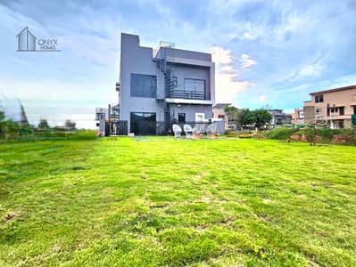 Designer House With Spacious Back Lawn At Height Location In Bahria Overseas