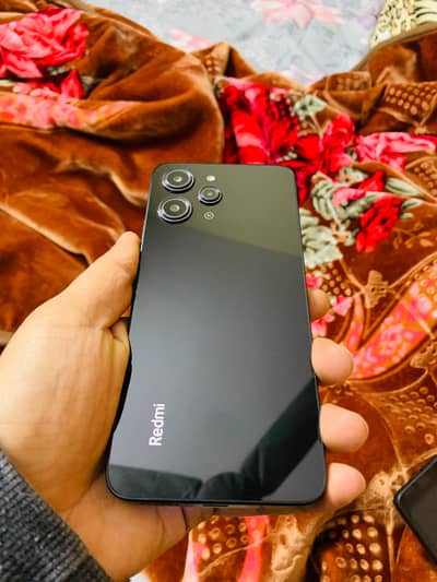 redmi 12 256gb best condition 10 on  10 box wagra sab available hai