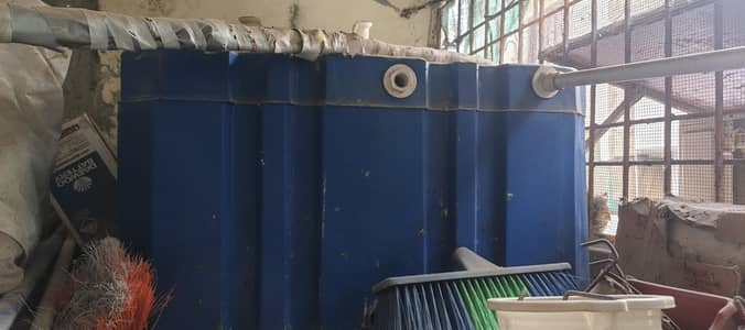 flat blue water tank