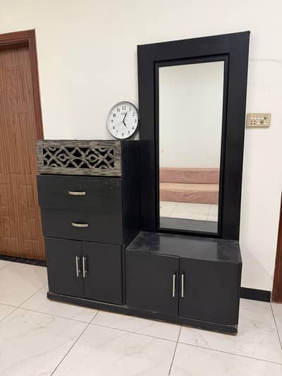 wooden bed and dressing