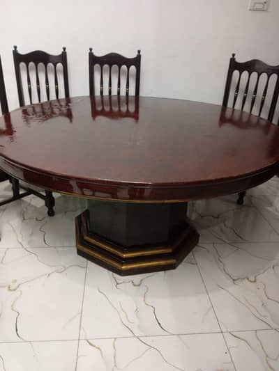 wooden round table with 6 chairs