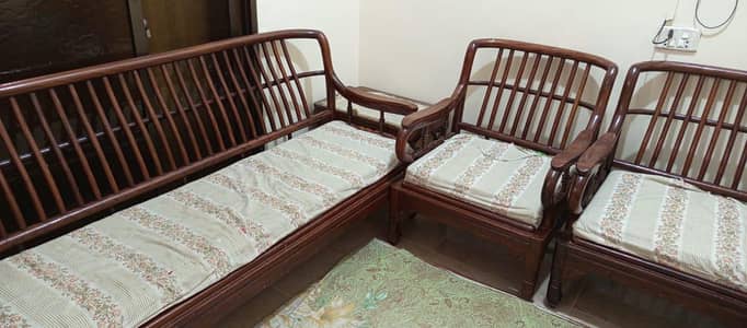 wooden sofa set with tables