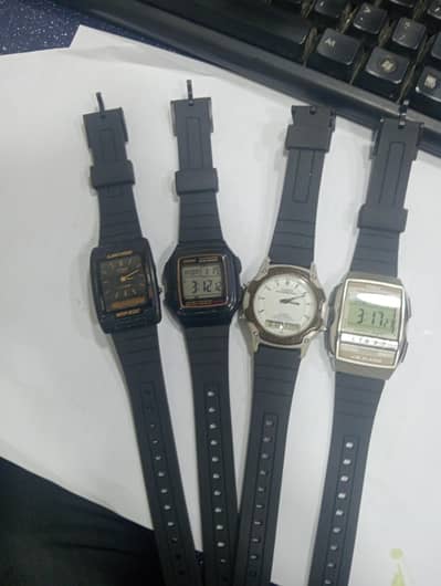 vintage Casio digital watch and dual time watch
