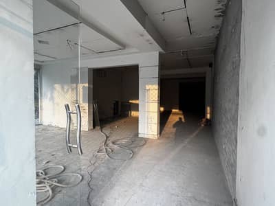 ** 2200 Sq Ft Ground Floor Commercial Hall for Rent Main Johar Town Boulevard (Facing Canal Road) **