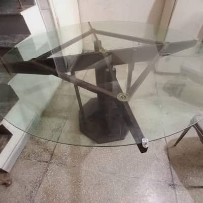 Wooden Dining table with round glass top and 6 steel chairs