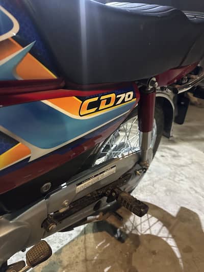 Honda CD70 2026 model Red color
