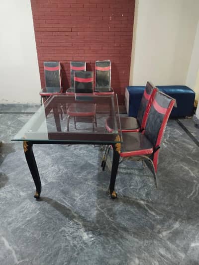 A unique and simple dining table with 6 chairs