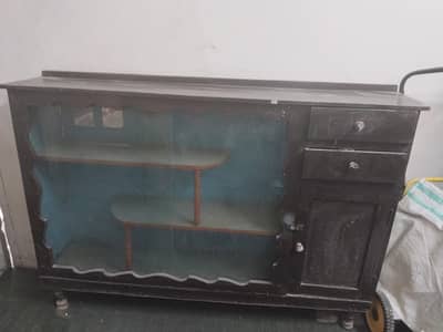 wooden showcase with  shelves