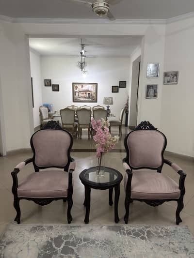 Twin chairs with wooden table