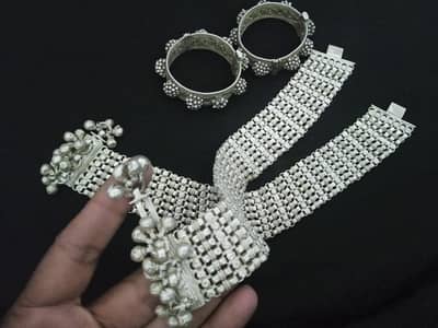 Silver anklets and Bangal