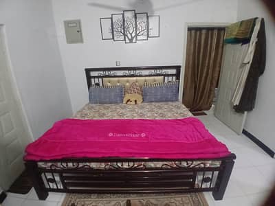 king size bed with 2 side tables