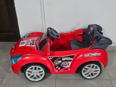 Kids red car (with charger)