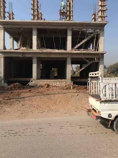 10 marla triple story Plaza in main adiala