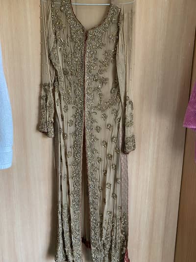 Gold coloured fancy formal dress