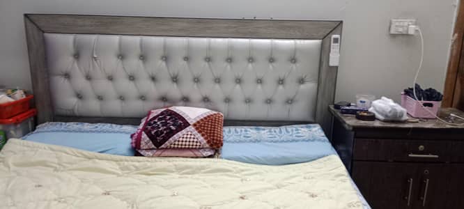 beautiful gray bed with mattress