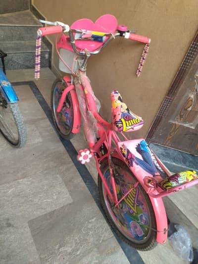 Baby cycle available for sale with baby girl helmet and water bottle