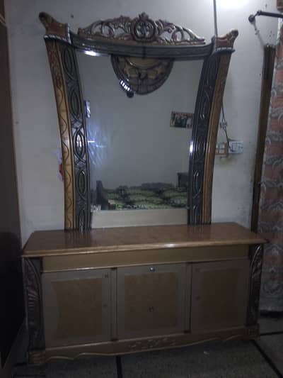 Bed with side tables and dressing table