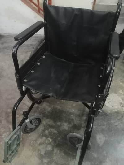 wheel chair unused pecked just open