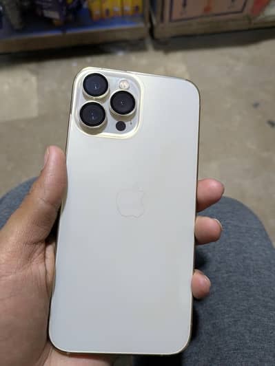 I phone 13 pro max jv 256 gb health 97 condition 10by10 gold colour