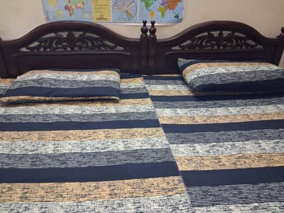 2 single beds for sale.