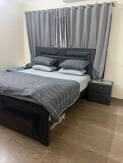 Grey bed for sale with curtains