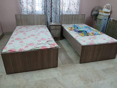 2 single beds with mattress