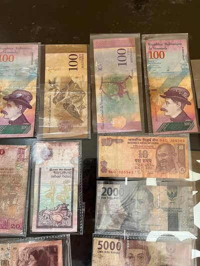 Vintage 110 worlds wide curry and Afkam Sadam Notes  for sell