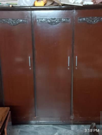 double bed with mattress, wardrobe and side board