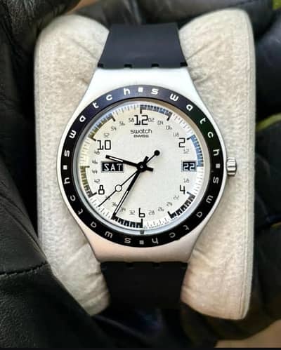 SWATCH  hijacker military field watch and SUPERDRY urban