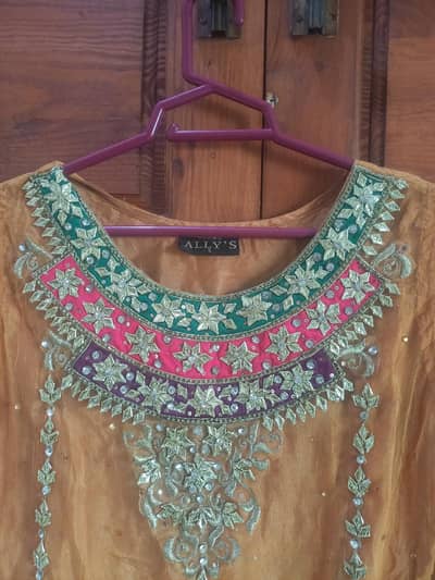 lightly used mustard gold ALLY'S kurti with green embroidery