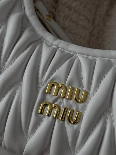 Miu Miu Wander matelassé nappa leather hobo bag - size small in white