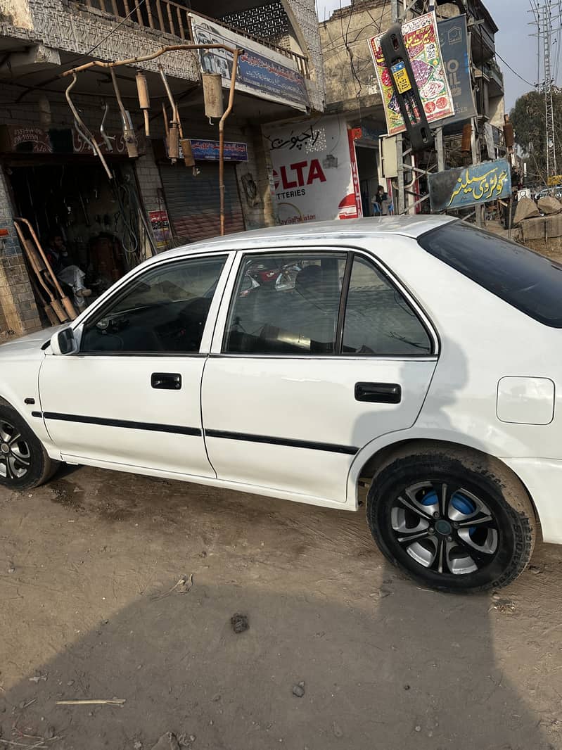 Exchange mehran alto etc city 2001 14 sy 16 tk pitrol avrage hai iski ...