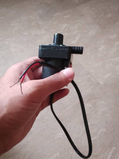 Brand: Shafi, type:  Water Pump. Voltage: DC 12V Power: 8W