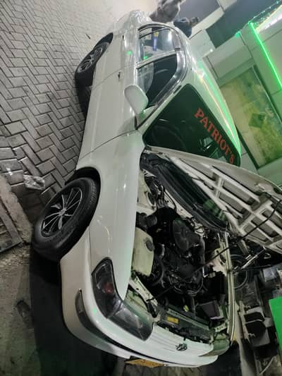 Indus corrolla 1998 own engine  white