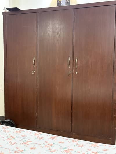 Selling this Bedroom set with dresser,wardrobe and side tables. .