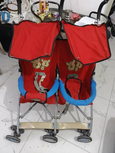 Twin pram for sale