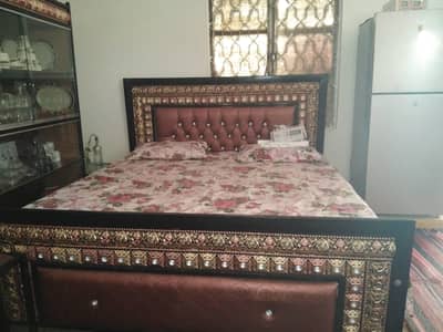 double bed with side table showcase dressing sofa set and one table