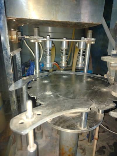 Semi automatic filling and capping machine