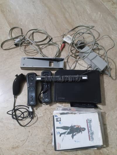 Nintendo Wii Console with 16 games