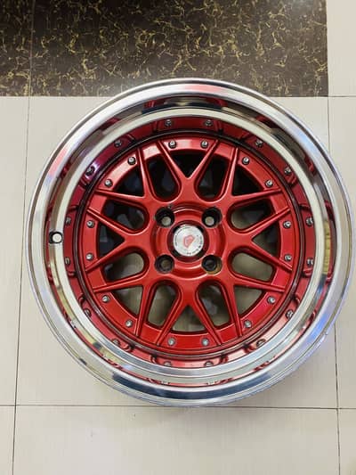 15 inches deep dish rims 4 nuts in good condition