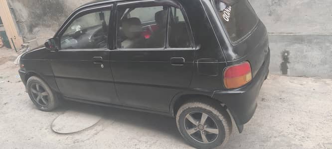 Daihatsu coure 2000 model black colour