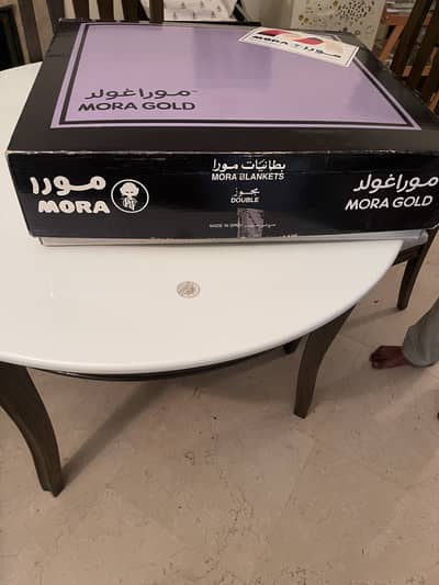 Unused mora gold blanket