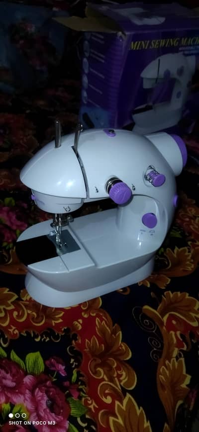 Mini sewing Mechine