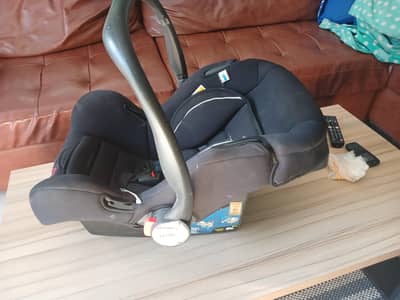 Tinnies Original carseat and baby carrier