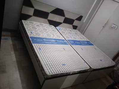 Two Single Beds for sale with mattress. Used for less than 6 months.