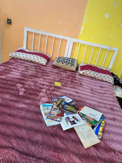 2 single iron beds for kids