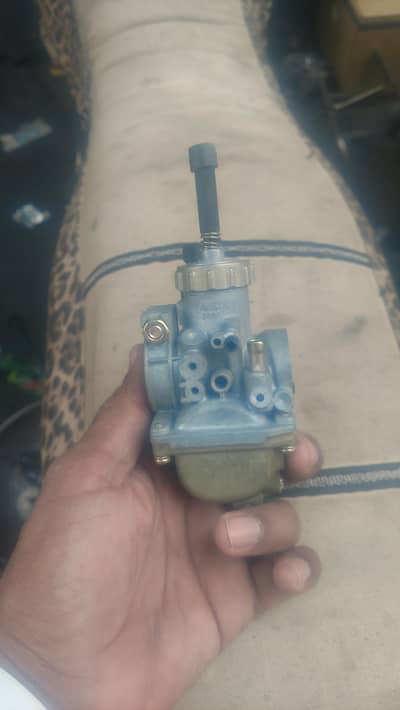 Yamaha 100 original carbuter .