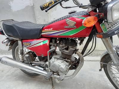 Honda 125 model 2013 red colour good condition
